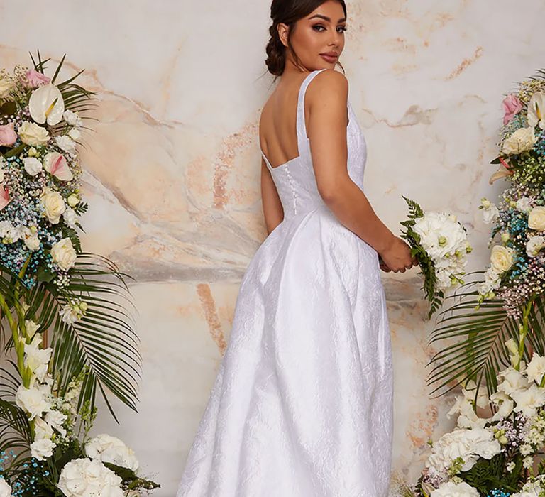 Sleeveless Chi Chi wedding dress with train