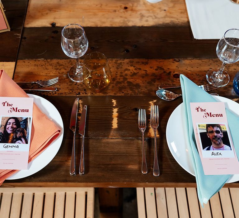 Pastel wedding place setting with polaroid place names for guests with mismatched napkins 