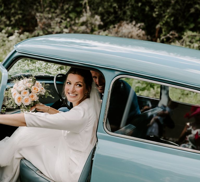 Hamshire wedding at Pylewell Park with blue mini