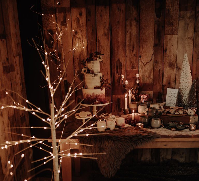 Dessert table with semi naked cake and treats 