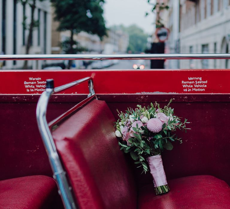 Gorgeous bridal bouquet on London wedding bus