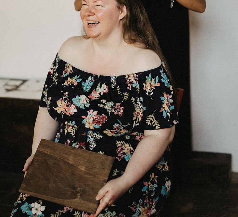 Tuscany bride having her long hair styled