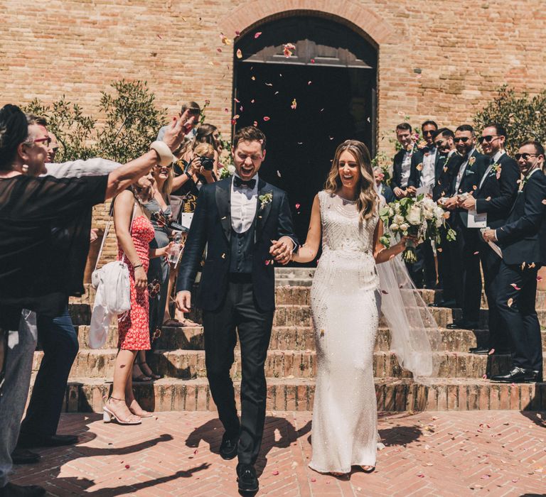 Confetti moment for bride and grooms Tuscany Italy Wedding 