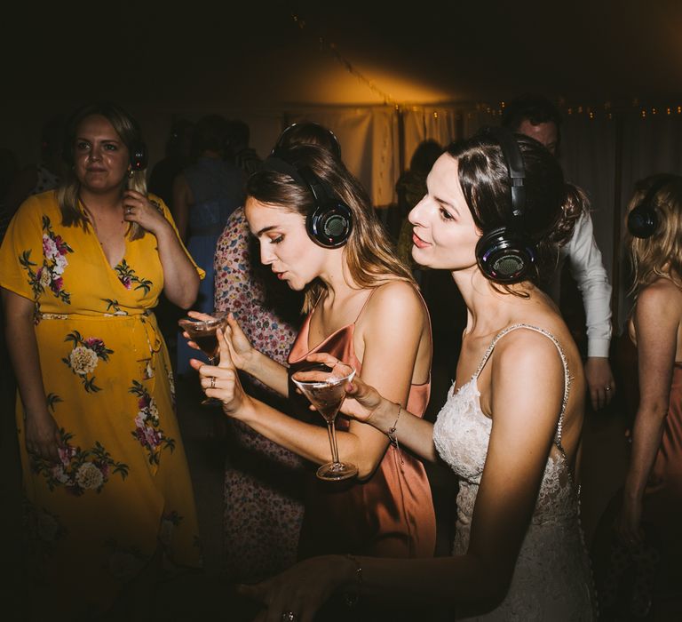 Bride during the silent disco at marquee reception