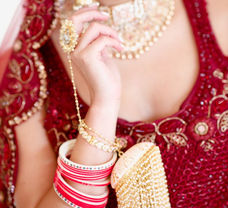 Bride wears gold jewellery on her wedding day