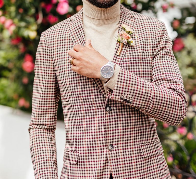 Groom in a brown check blazer for a sunny yellow wedding in Chelsea