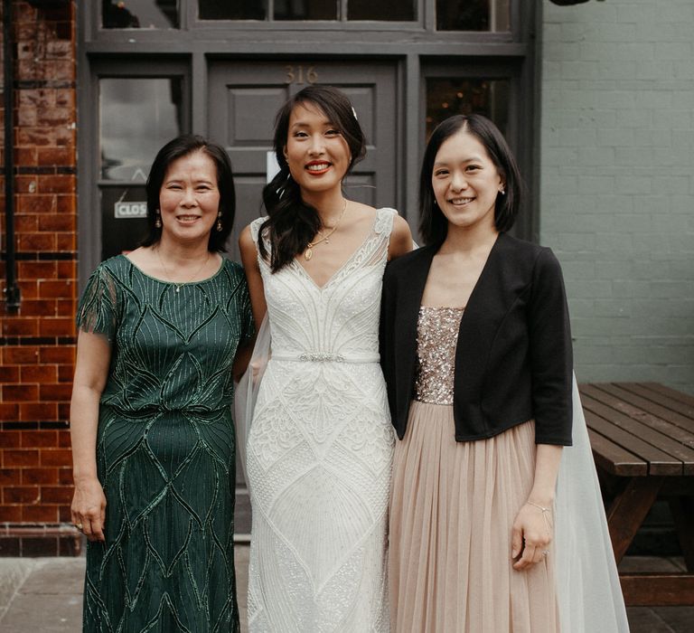 The bride with her mother and sister