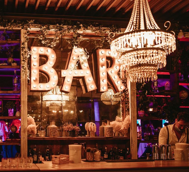 Bar sign complete with chandeliers  