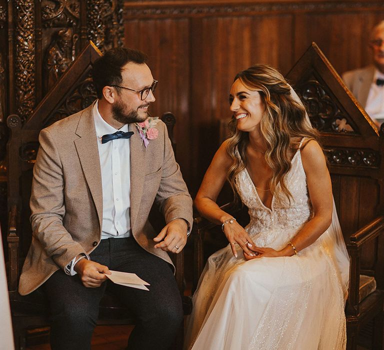 Bride & groom look lovingly at one another on their wedding day 