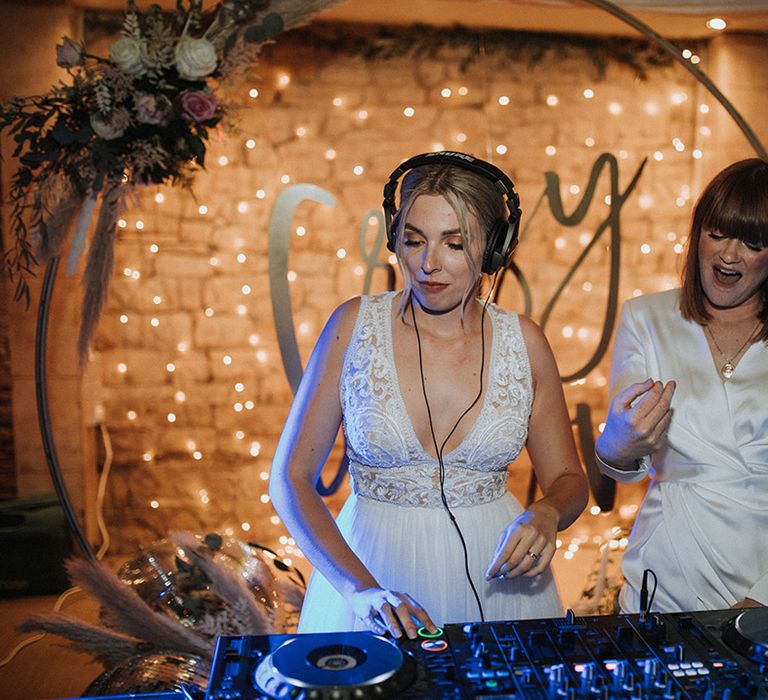 Brides DJ with fairy light backdrop