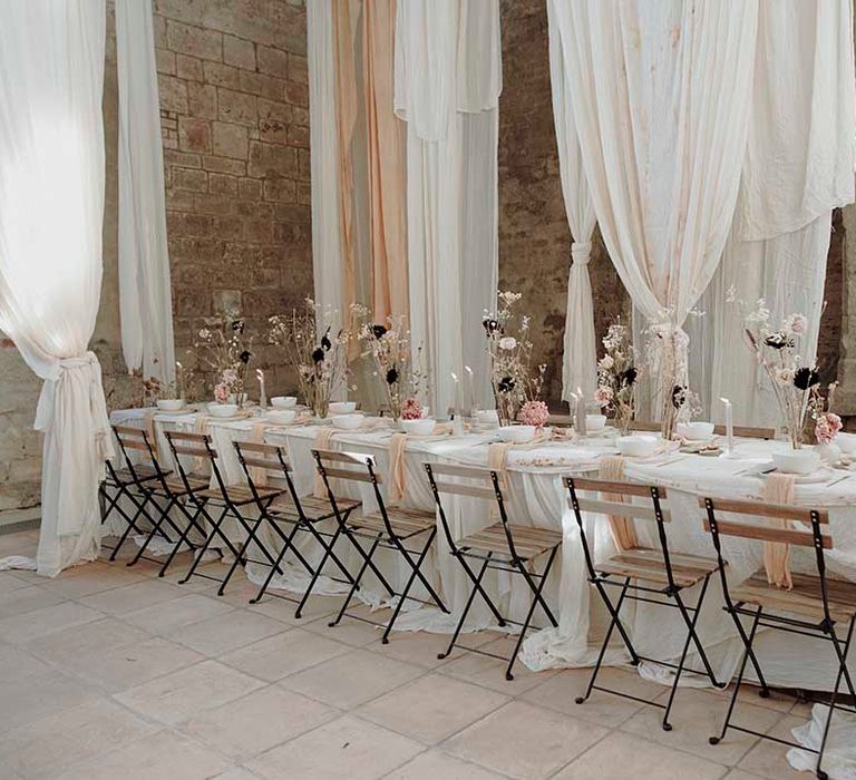 Hanging fabric installations at modern Blackfriars Priory wedding 