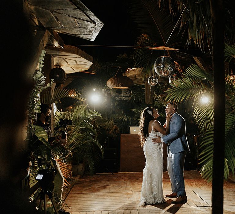 Bride and groom sharing their first dance in Tulum