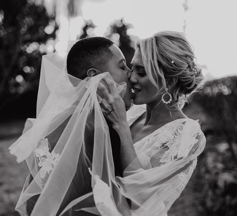 Intimate black and white wedding photograph of an LGBTQI+ couple at Hodsock Priory 