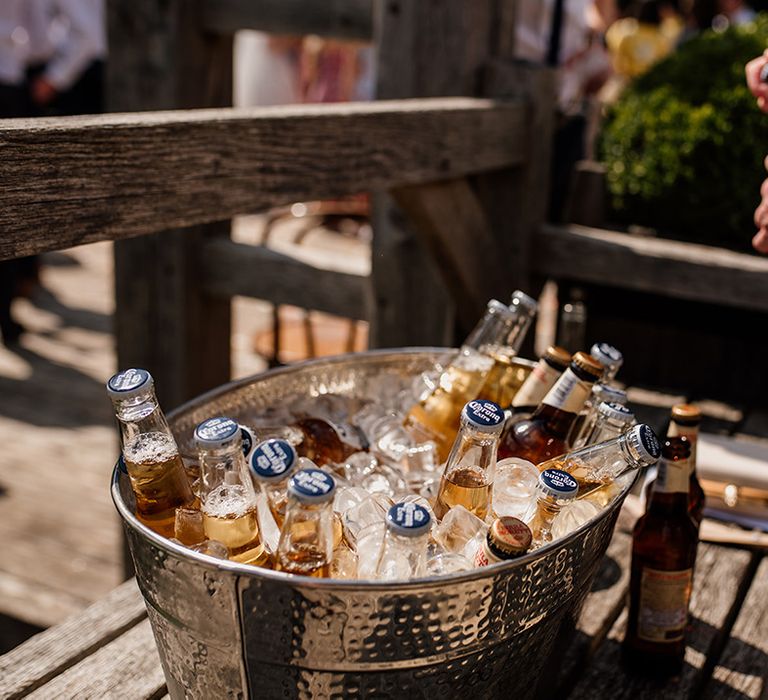 Ice bucket full of Corona bottles of beer