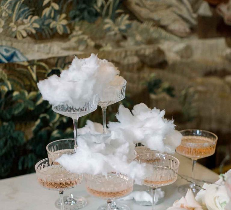 Wedding champagne tower with candy floss champagne toppers 