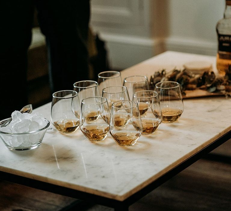 Shots of whiskey for the groom and groomsmen on the morning of the wedding 