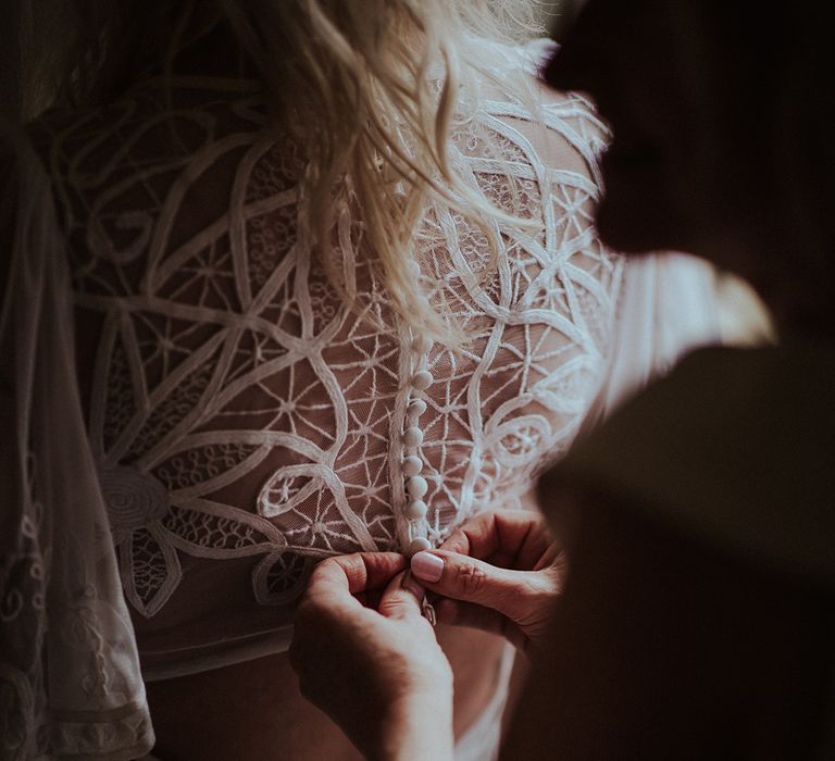 Bride in delicate lace wedding dress from ASOS