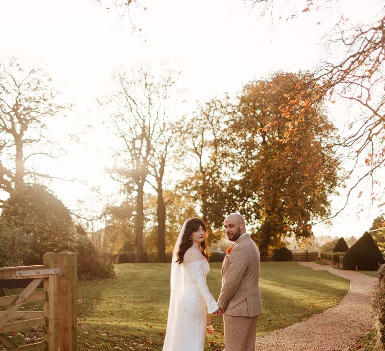 Couple portrait of the bride and groom during golden hour 