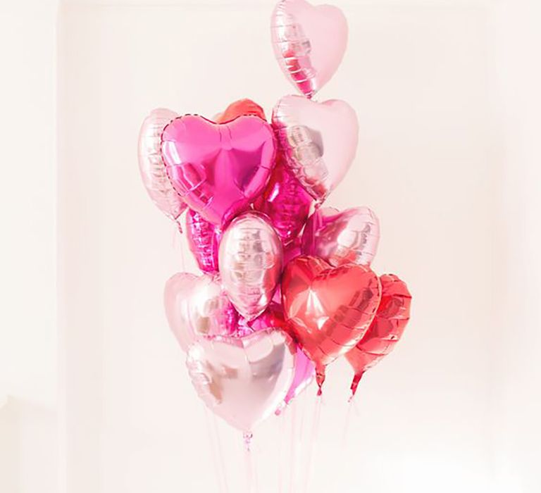 Pink and red heart balloons by Julia And You Photography