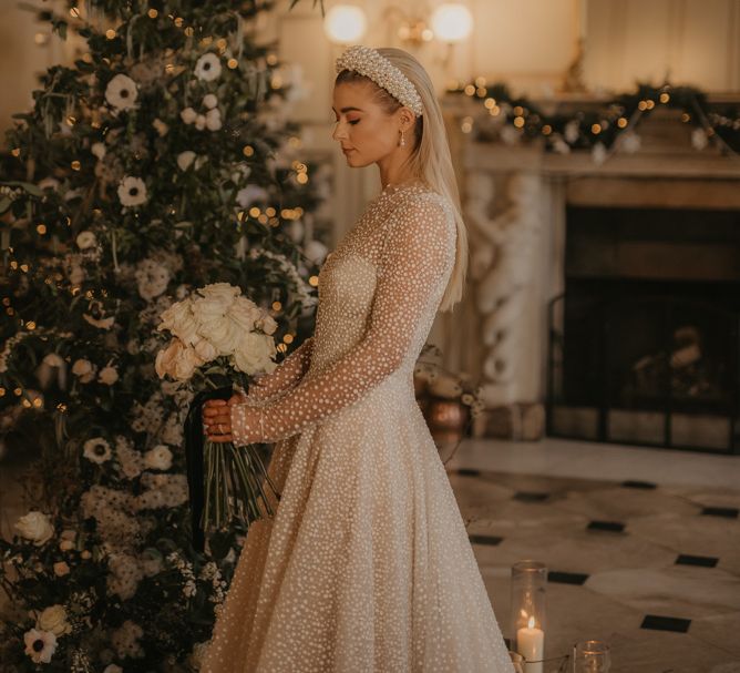 Cosy winter wedding with Christmas tree wedding decor 