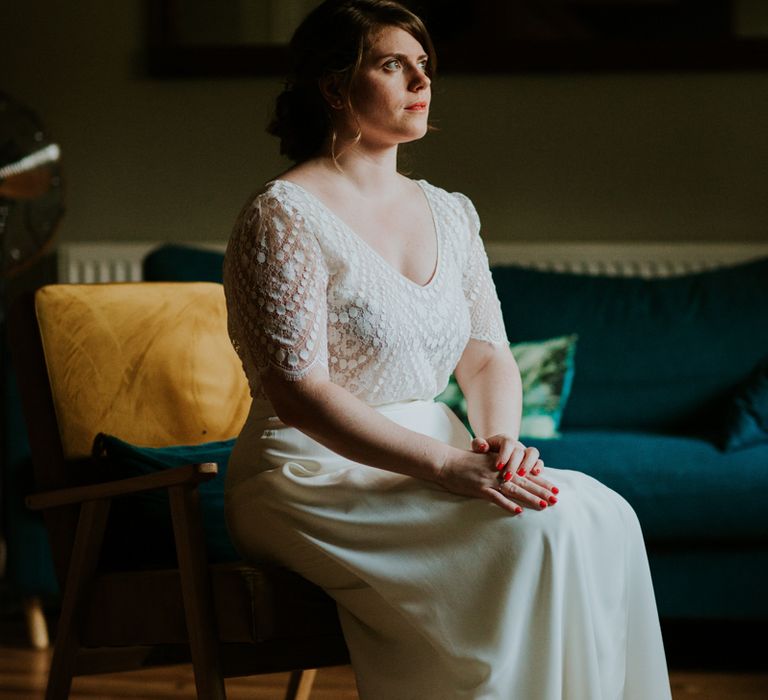 Bride on wedding morning in a Laure de Sagazan wedding dress