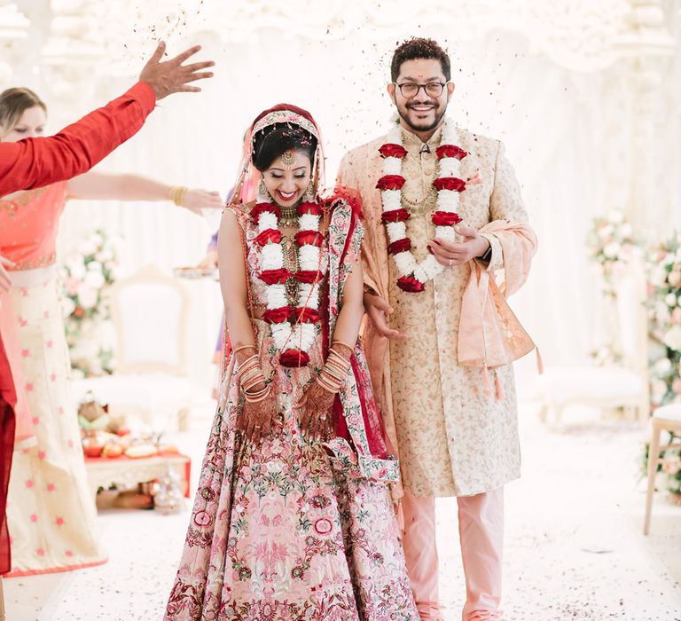 Bride and groom just married at intimate Hindu wedding ceremony at Northbrook Park 