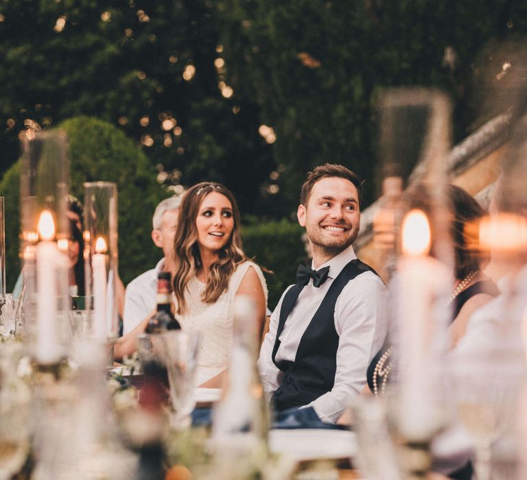 Happy newly-wed couple celebrating at their wedding in Italy