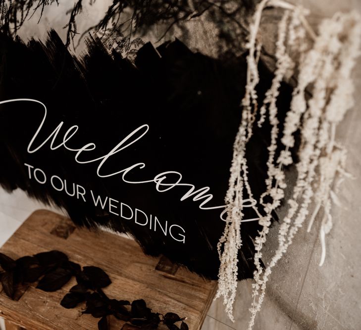 Black welcome sign for wedding 