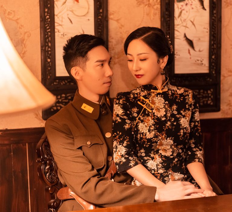 Chinese couple sit together during Heritage engagement shoot