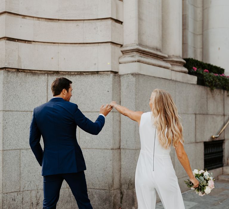 Bride & groom dance in London after wedding ceremony