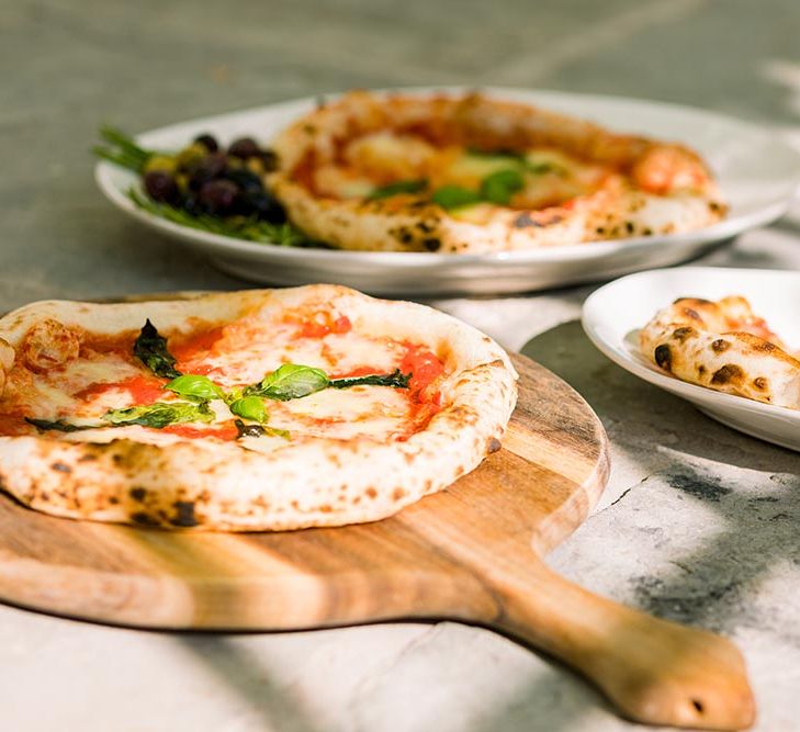 Wood fired pizza van at outdoor wedding 