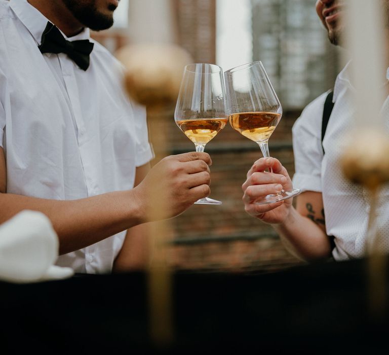 Grooms cheers at New York wedding