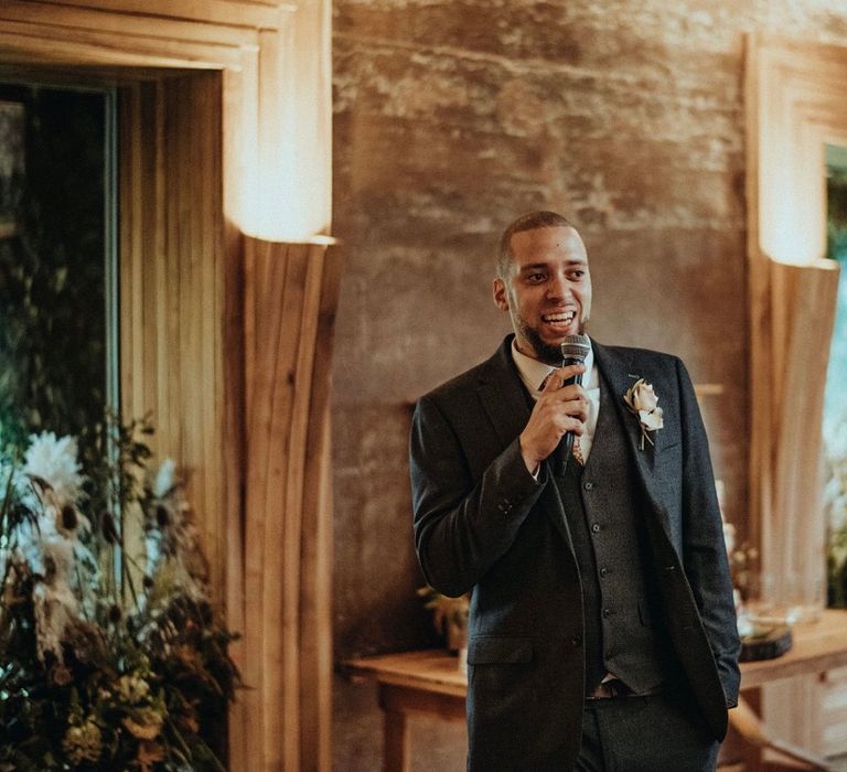 Wedding guest gives speech on the day of wedding at Elmore Court