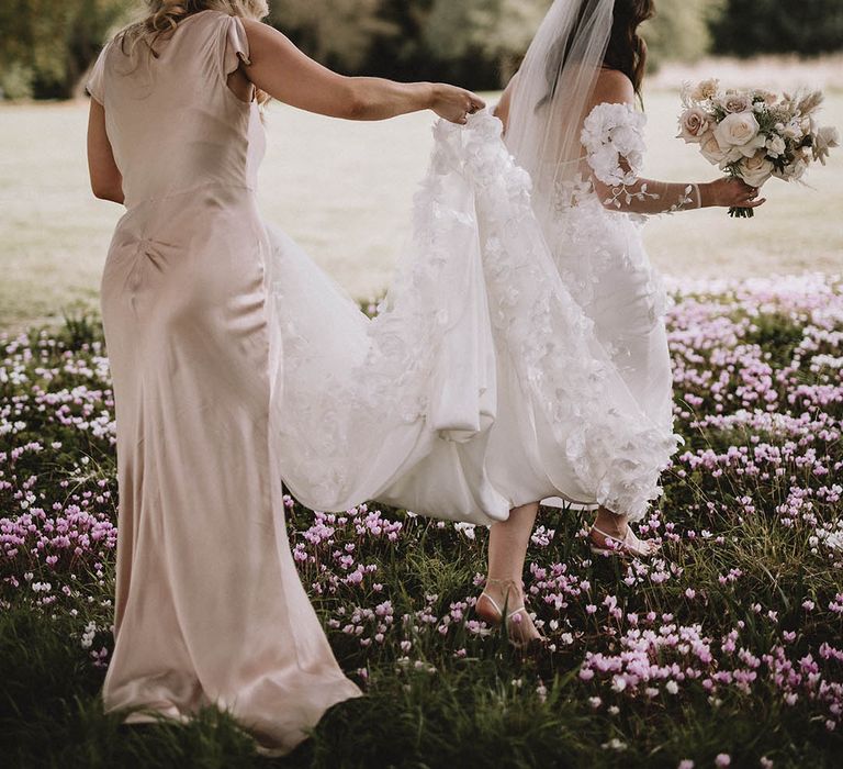 Light pink satin bridesmaid dresses and bespoke bridal gown