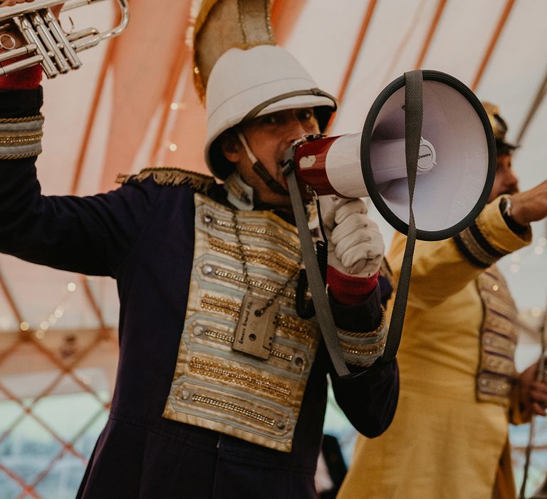 Wedding band entertainment has a megaphone during reception