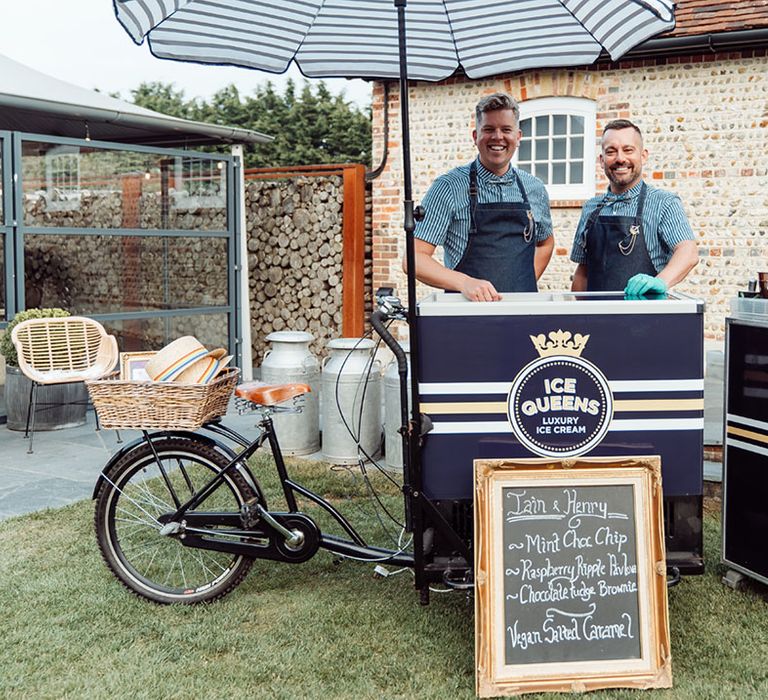 Ice Queens ice cream stand for wedding guests with personalised sign with the couple's favourite flavours of ice cream