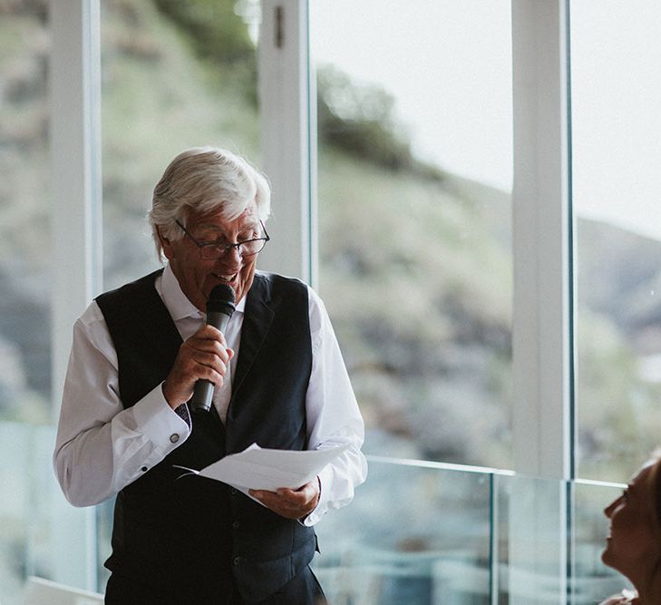 Brides father gives speech on her wedding day for Tunnels Beach wedding 