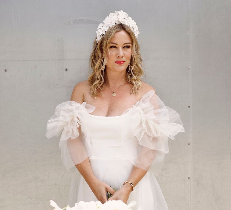 Bride wearing flower white hair crown with Halfpenny London Mayfair wedding dress 