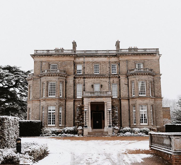 Hedsor House black tie winter wedding with snow 