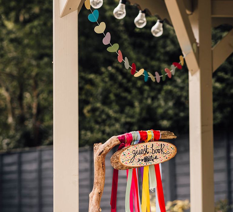 Colourful DIY ribbon rainbow decoration and welcome sign 