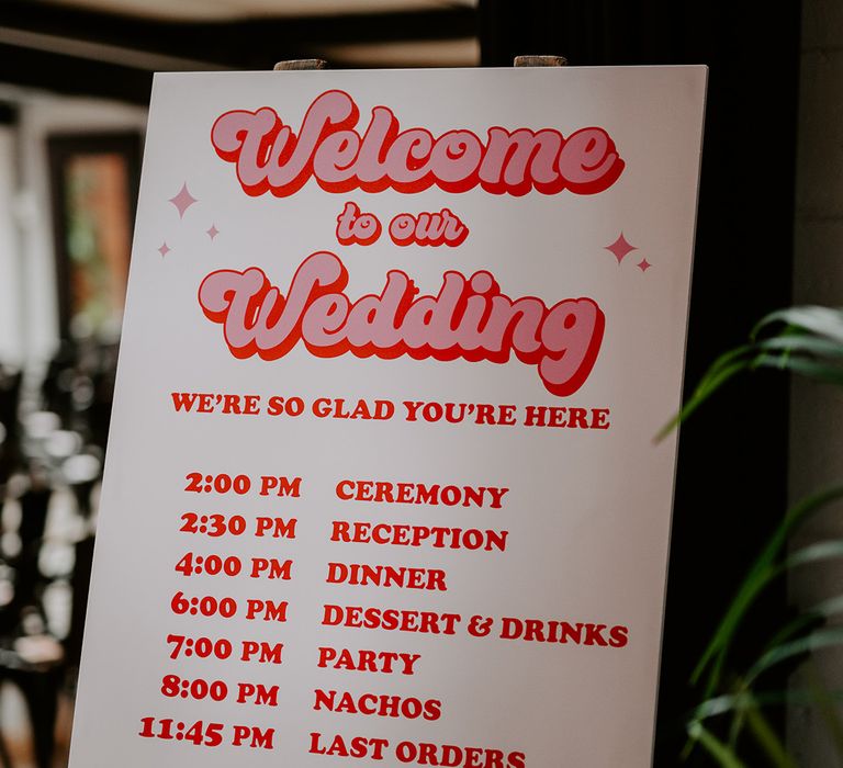 Pink retro wedding welcome sign for disco wedding inspired by iconic 80s movies 