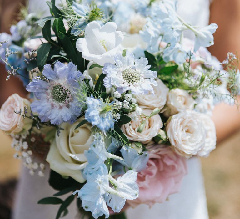 Light pastel blue and white wedding flower bouquet 