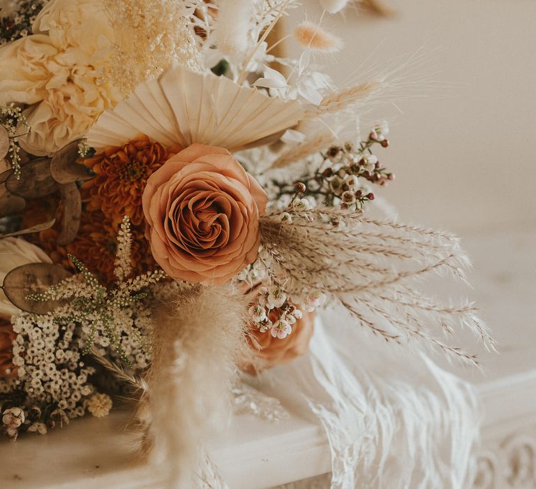 Neutral and peach, dried and fresh wedding flowers 