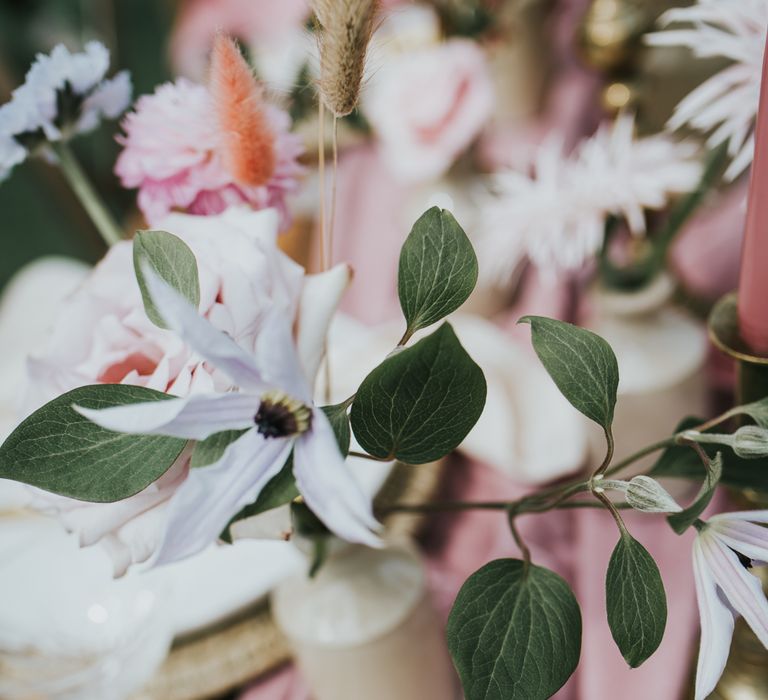 Wedding flower stems in ink wells