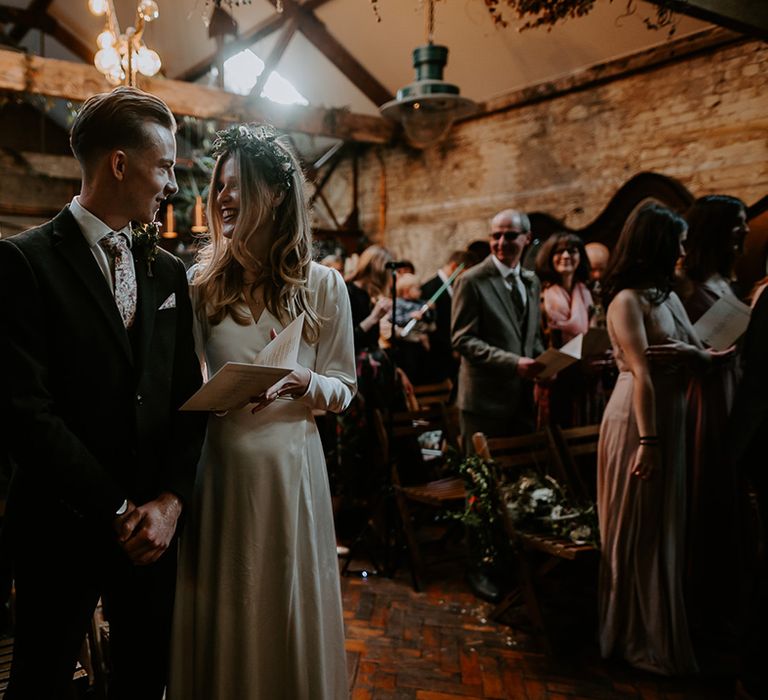 Bride & groom look lovingly at one another on their wedding day