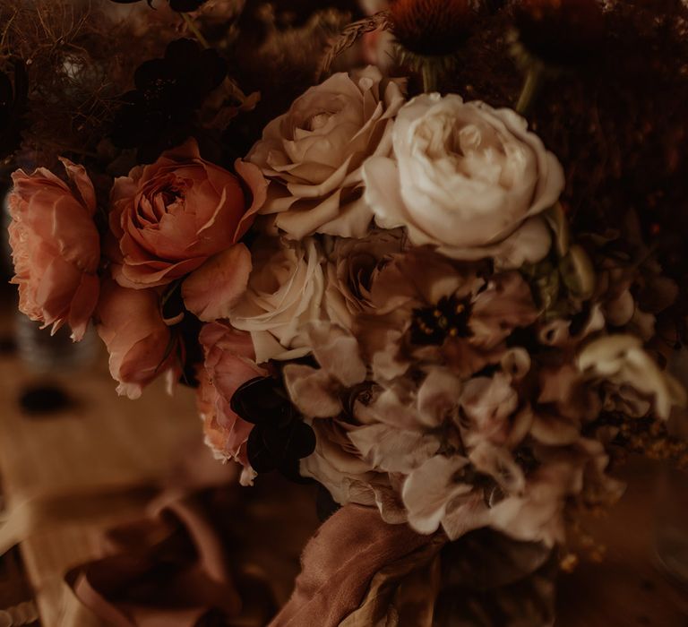 Pink and white rose muted wedding bouquet 