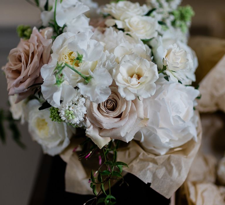 Pastel pink and white rose bridal bouquet 