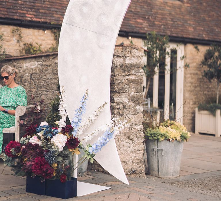 DIY crescent moon wedding decoration made by the bride's dad for the celestial theme wedding 