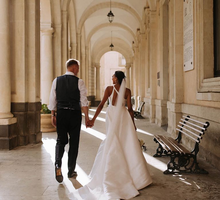 Church wedding with bride in a Jane Hill wedding dress with racer back details 