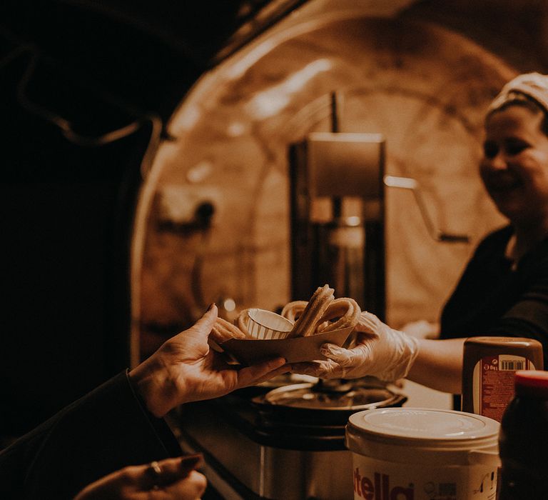 Vegan churros evening food being served by House of Flavours catering 